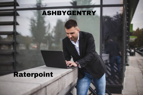 Person using a laptop to complete tasks on Raterpoint platform.